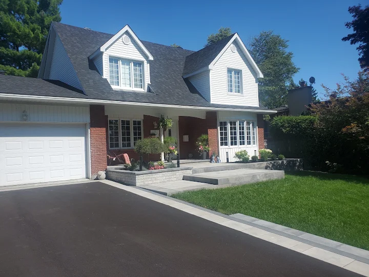 Paved driveway and entrance steps at a family home
