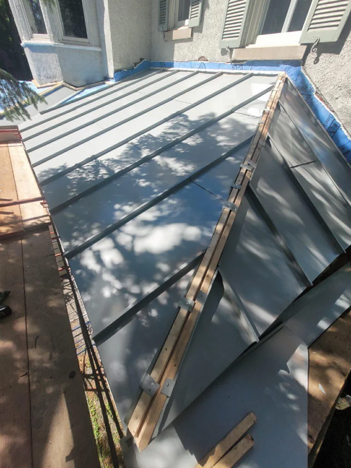 New metal roof being installed on a home